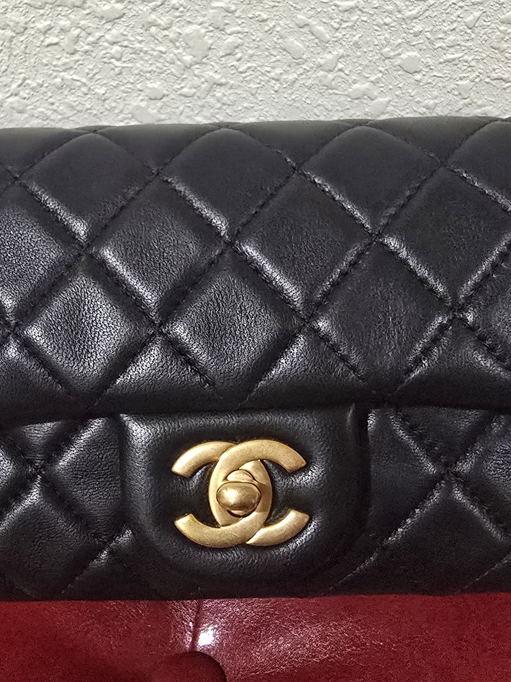 CHANEL Black Quilted Shoulder Bag with Gold CC Lock